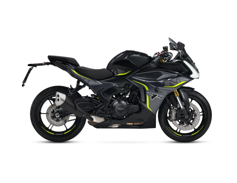 Benelli-tornado-550 1 - AutoBike Side view of a black sport motorcycle with neon yellow accents and a large exhaust tailpipe. - AutoBike