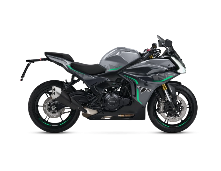 Benelli-tornado-550 2-5 - AutoBike Side view of a gray sport motorcycle with green accents and black exhaust - AutoBike