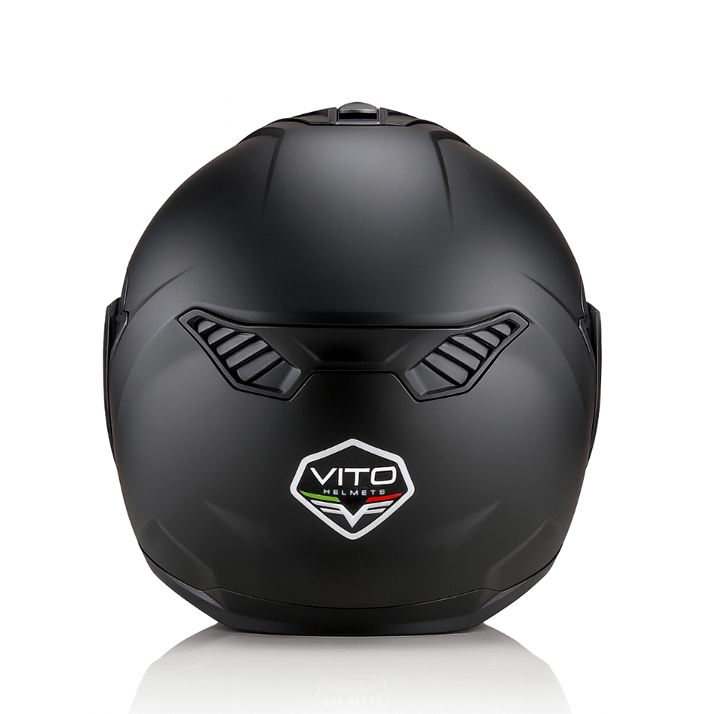 Vito flip-up reverse6 - AutoBike Rear view of a matte black Vito helmet with two ventilation vents and a white logo badge on the back. - AutoBike