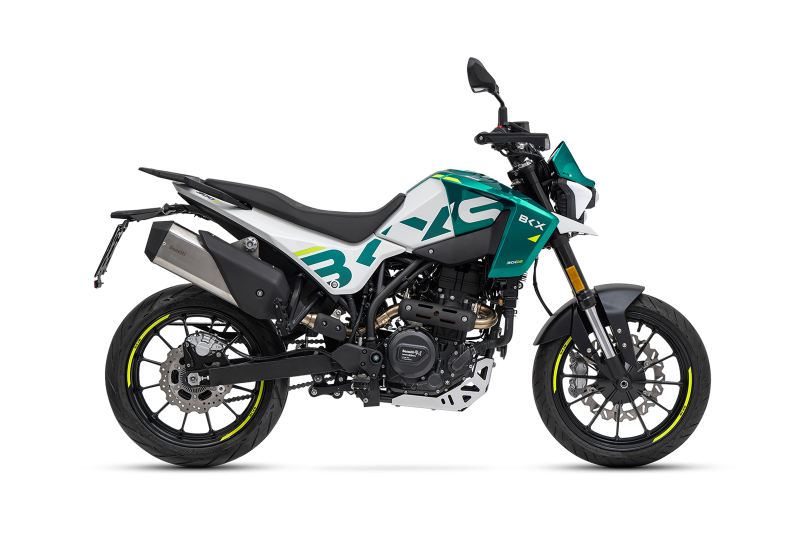 Benelli-bkx-125-s 8 - AutoBike Green‑white sport motorcycle shown in profile with yellow accents and exposed mechanicals, on a black background - AutoBike