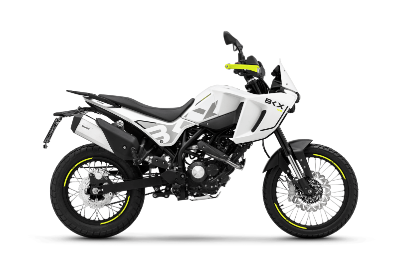 Benelli-bkx-125-s 9 - AutoBike White dual-sport motorcycle shown in side profile with black frame and neon yellow rim accents - AutoBike